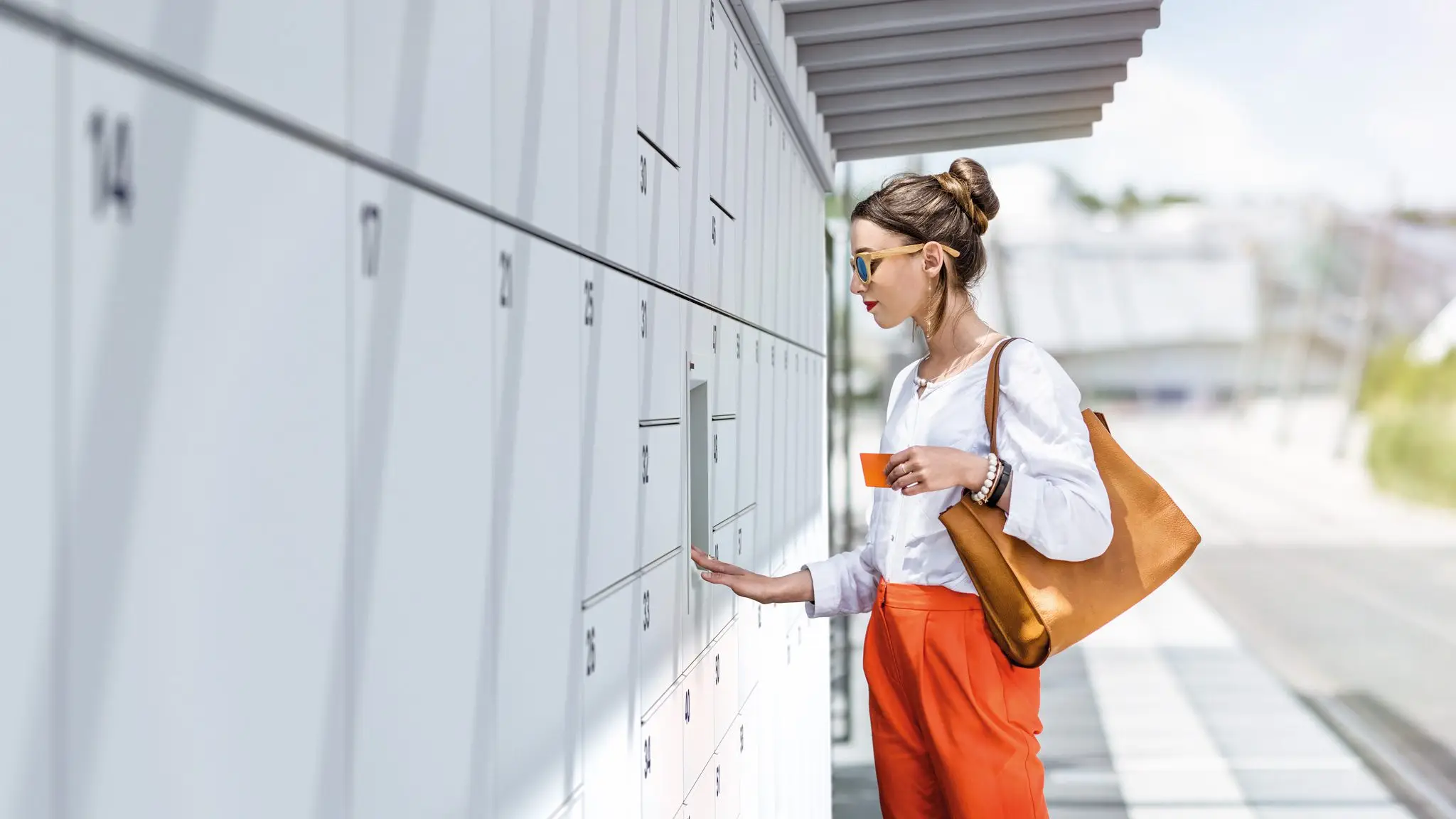 Woman uses locker system